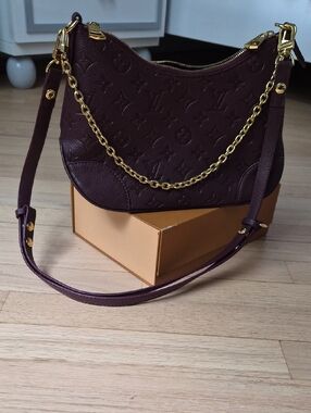 Louis Vuitton Embossed Shoulder Bag in Deep Plum with Gold Hardware
